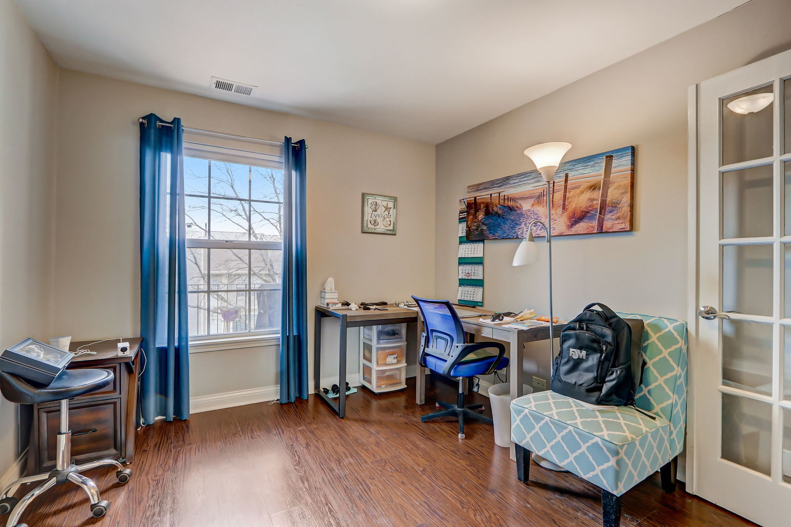 628 Village Road, Unit B Crystal Lake, IL 60014 - Photo 23 of 33 a living room with furniture and wooden floor