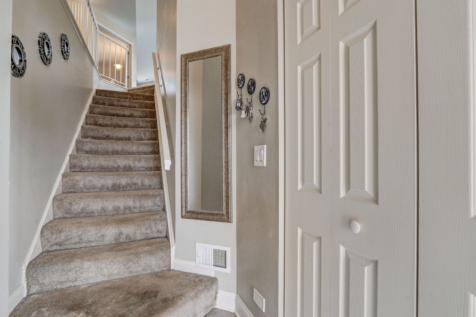 628 Village Road, Unit B Crystal Lake, IL 60014 - Photo 4 of 33 a view of an entryway with stairs