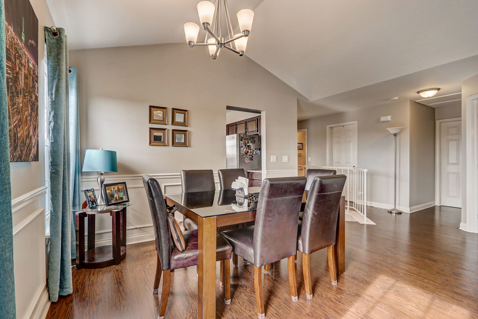 628 Village Road, Unit B Crystal Lake, IL 60014 - Photo 6 of 33 a view of a dining room with furniture and wooden floor