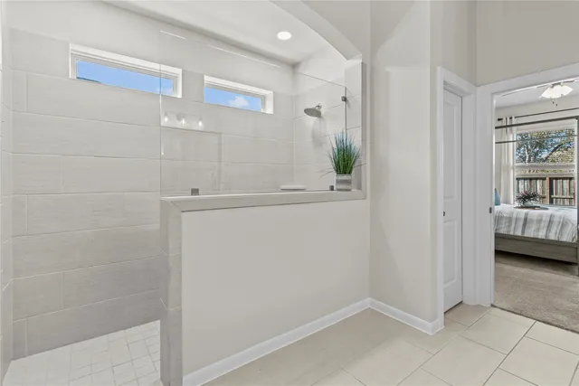 a view of hallway with livingroom and furniture