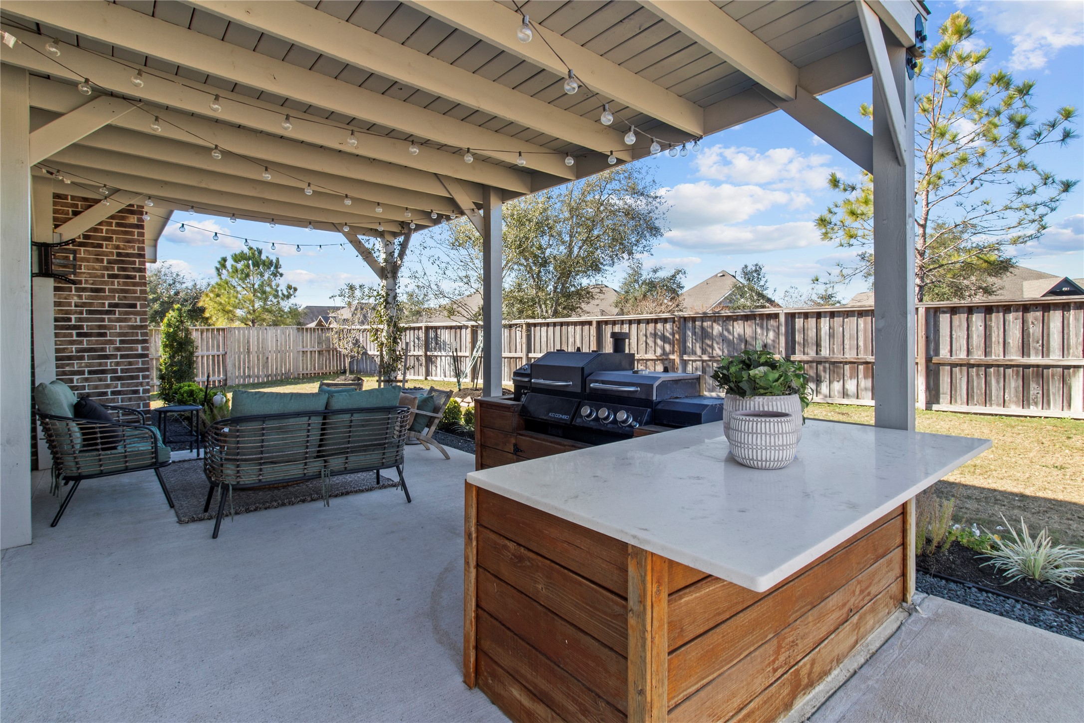 10010 Napier Drive Rosharon, TX 77583 - Photo 27 of 38 Custom built space for BBQ pit on back patio