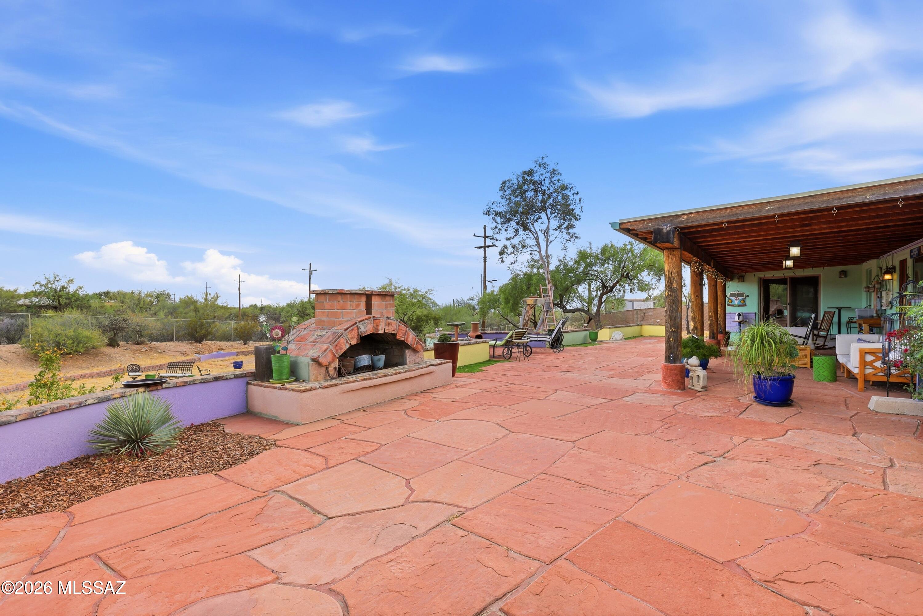 220 East Magee Road Tucson, AZ 85704 - Photo 29 of 38 Flagstone:outdoor fireplace