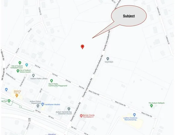 a bathroom with a shower and a mirror