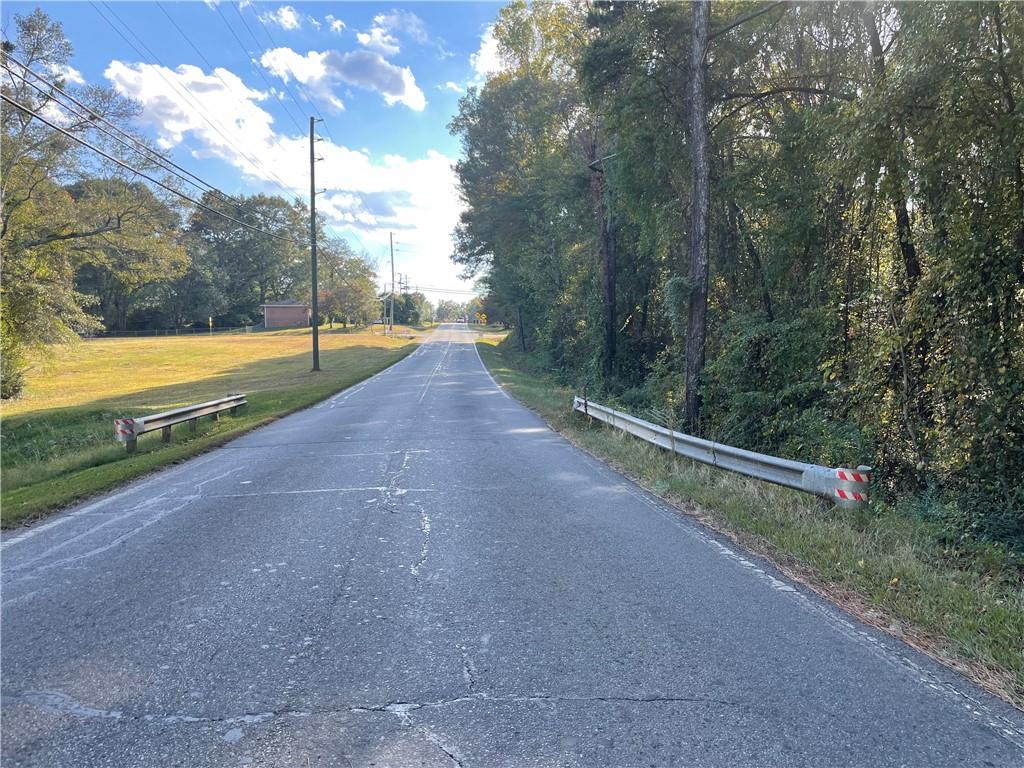44 County Line-Auburn Road Auburn, GA 30011 - Photo 7 of 10 a view of a yard with a large tree