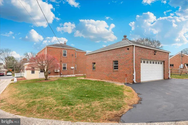 a view of a house with a big yard