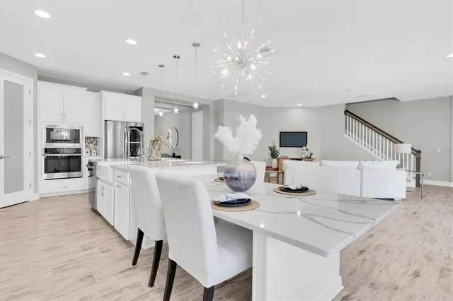 a workspace with furniture and a window