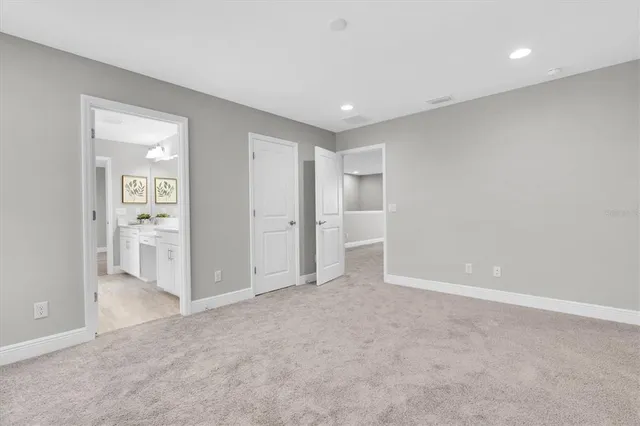 a view of a house with backyard and porch