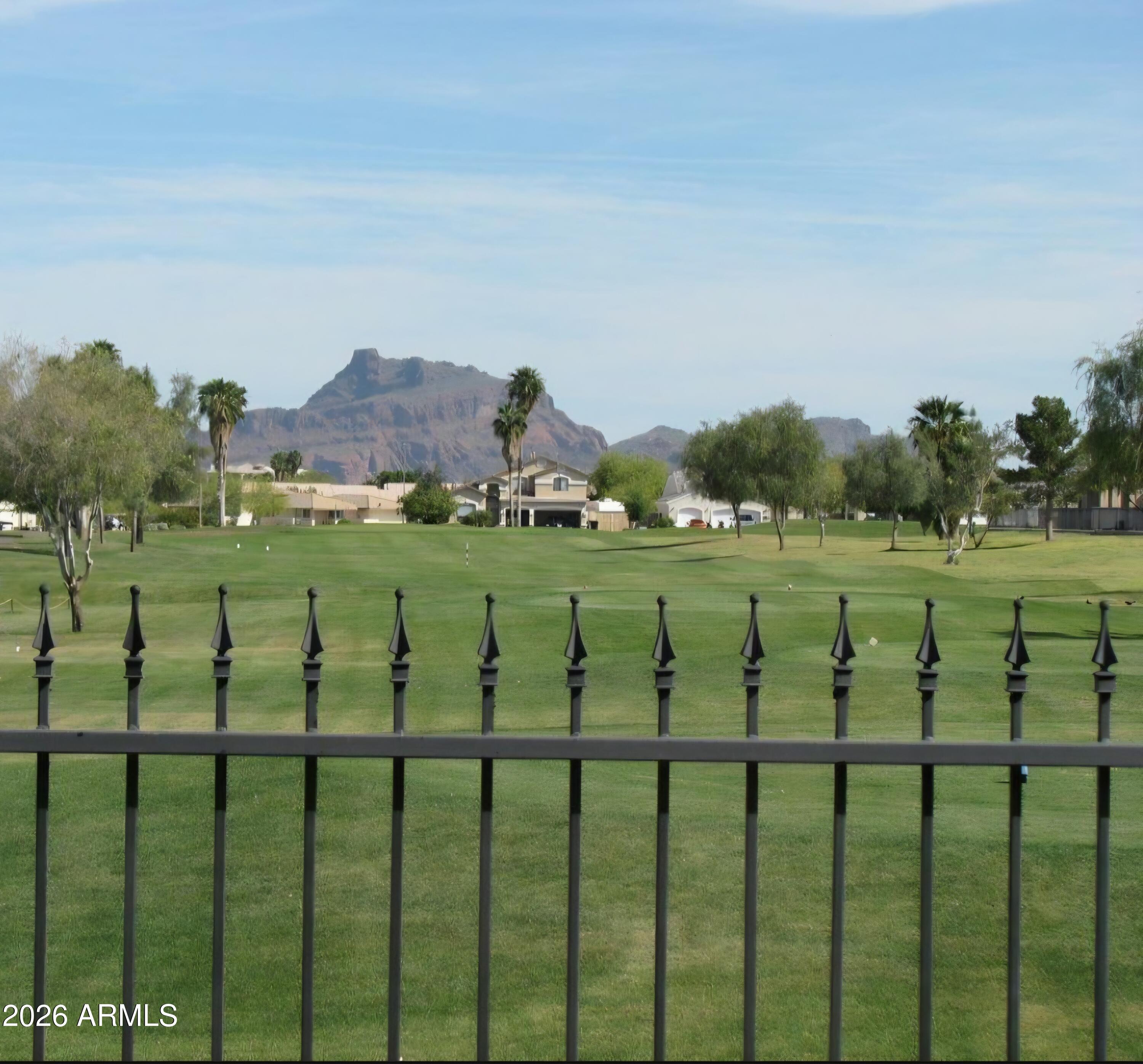 6202 East McKellips Road, Unit 115 Mesa, AZ 85215 - Photo 31 of 43 a view of a golf course with a area