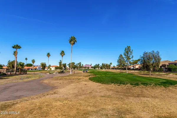 a view of a playground and a yard