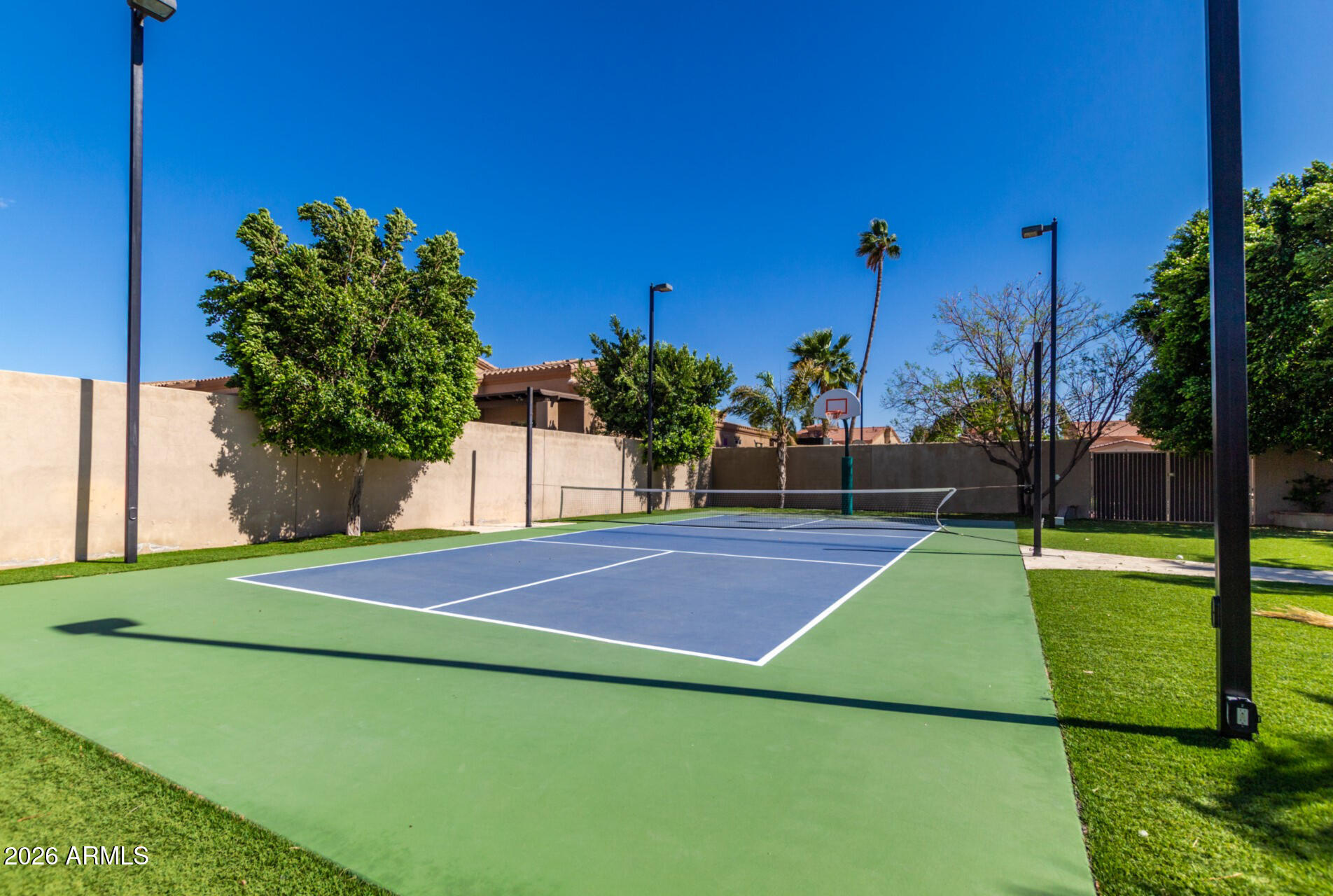 6202 East McKellips Road, Unit 115 Mesa, AZ 85215 - Photo 41 of 43 a view of a tennis court