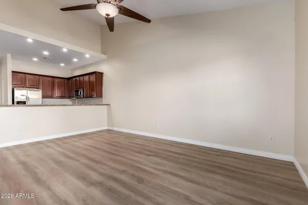 a view of a kitchen with a sink and a microwave