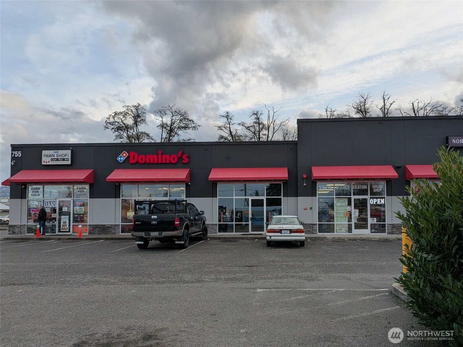a car parked in front of a building