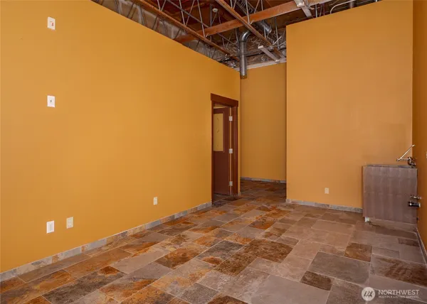 a view of small space with racks on the wall