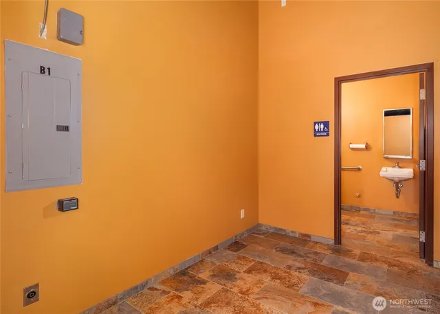 a view of a big room with a door