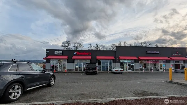 a car parked in front of a store