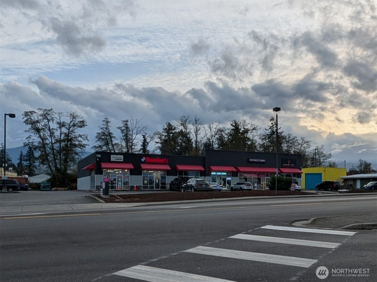 755 West Washington Street, Unit C Sequim, WA 98382 - Photo 6 of 21 a view of street with cars