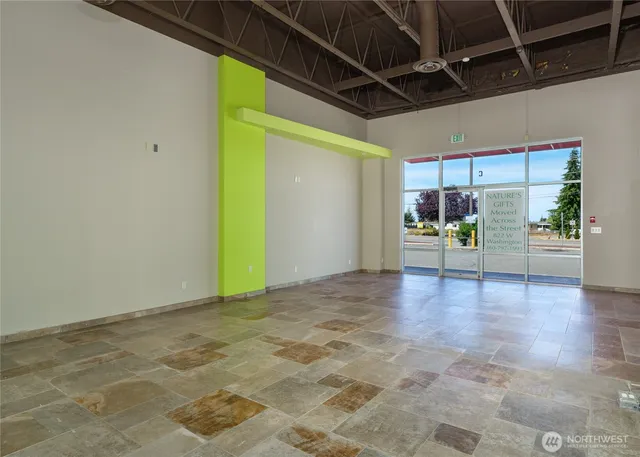 a view of a livingroom with wooden floor