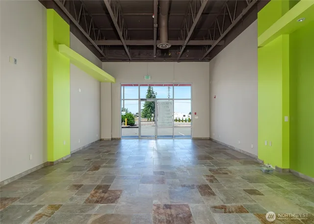 a view of entryway with a front door