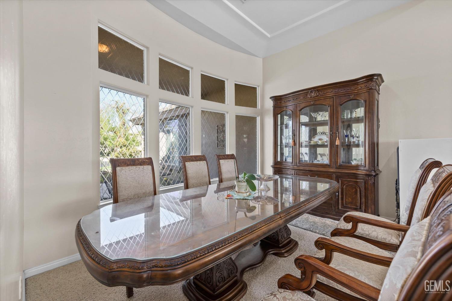 Undisclosed Address Bakersfield, CA 93312 - Photo 19 of 50 a dining room with furniture