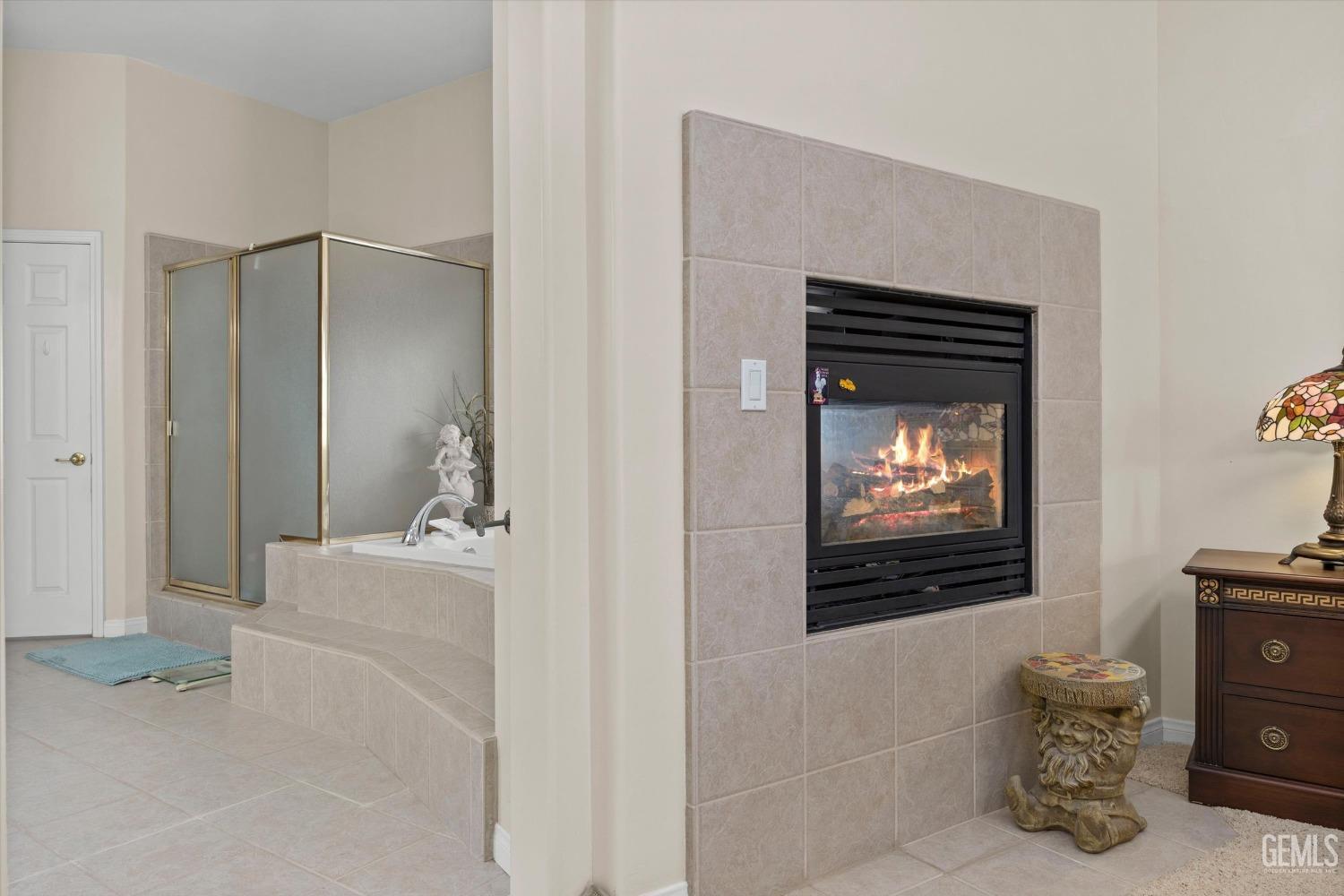 Undisclosed Address Bakersfield, CA 93312 - Photo 31 of 50 a view of living room with furniture and a flat screen tv