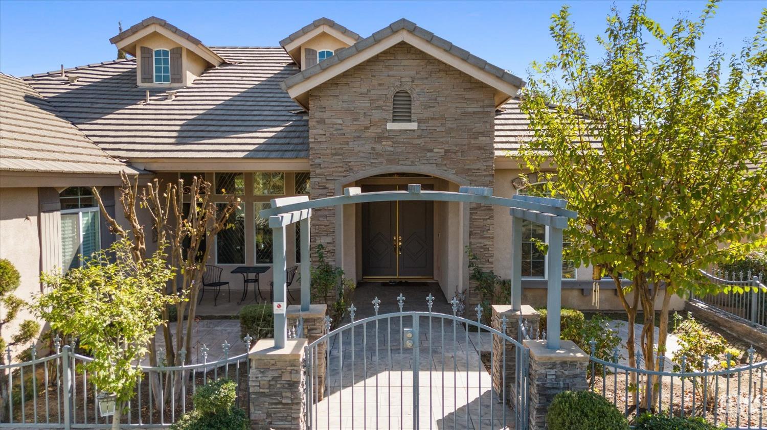 Undisclosed Address Bakersfield, CA 93312 - Photo 4 of 50 a front view of house