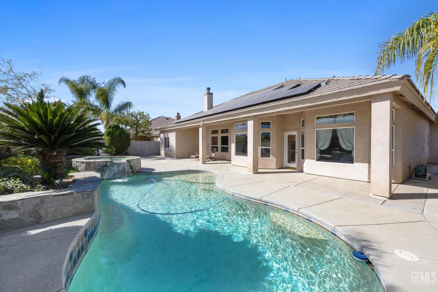 Undisclosed Address Bakersfield, CA 93312 - Photo 43 of 50 a view of house with outdoor space and swimming pool