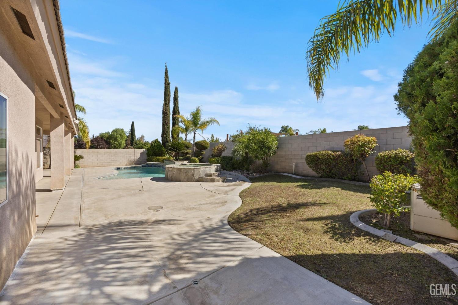 Undisclosed Address Bakersfield, CA 93312 - Photo 44 of 50 a view of a street with an outdoor space