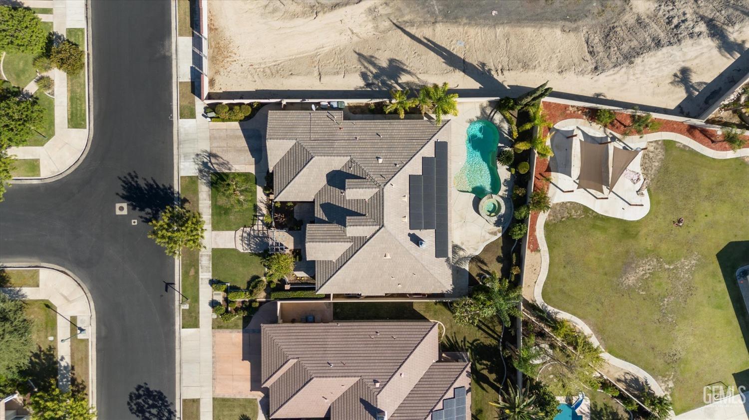 Undisclosed Address Bakersfield, CA 93312 - Photo 8 of 50 an aerial view of houses with outdoor space