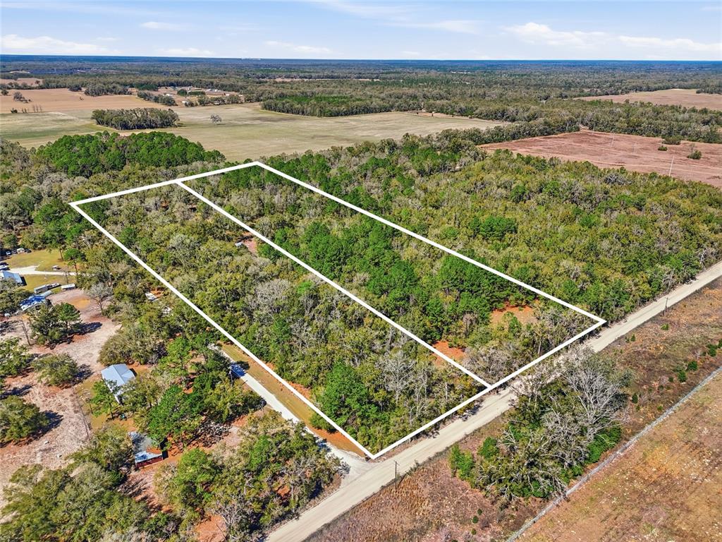 Tbd Southwest Fry Avenue, Unit B Fort White, FL 32038 - Photo 6 of 7 a view of a balcony with ocean view