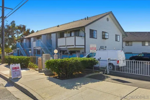 a car parked in front of a house
