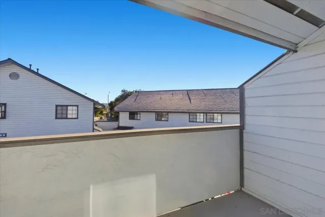 a bathroom with a shower and a toilet
