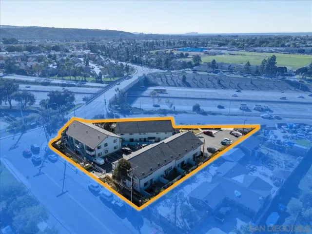 a blue bed sitting in a blue chair and table