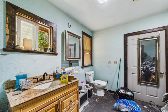 a bed room with a bed and furniture