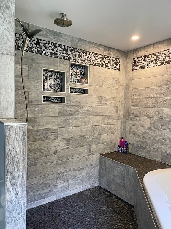 241 Thompson Road Colrain, MA 01340 - Photo 18 of 42 a bathroom with a bathtub and shower