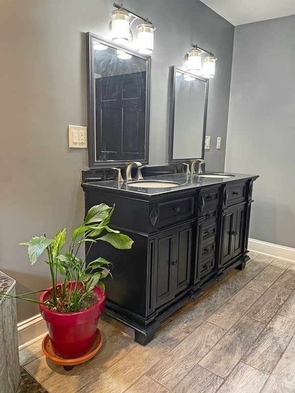 241 Thompson Road Colrain, MA 01340 - Photo 21 of 42 a bathroom with a sink and a mirror