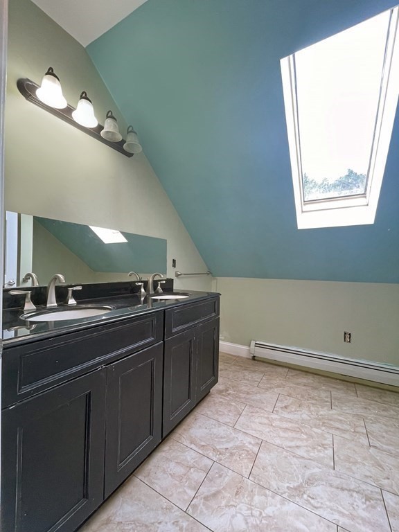 241 Thompson Road Colrain, MA 01340 - Photo 31 of 42 a room with painting and a sink