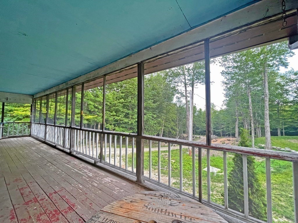 241 Thompson Road Colrain, MA 01340 - Photo 34 of 42 a view of a balcony with wooden floor