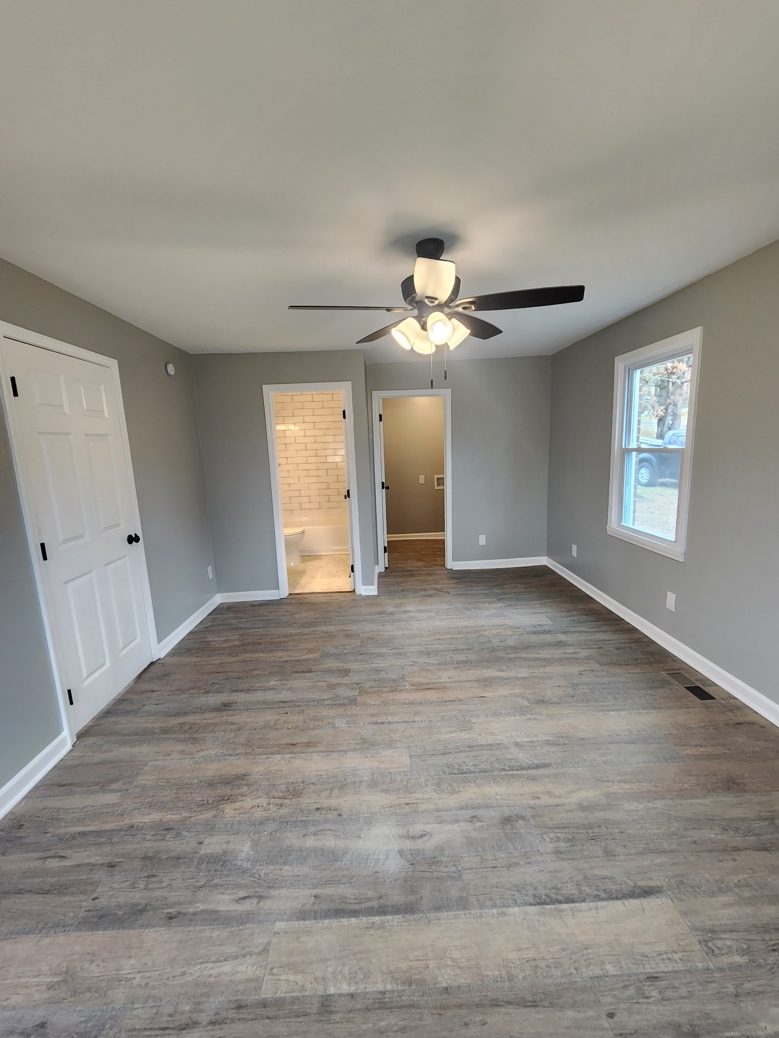 1301 Riley Hill Road Pulaski, TN 38478 - Photo 11 of 23 a view of empty room with window and ceiling fan