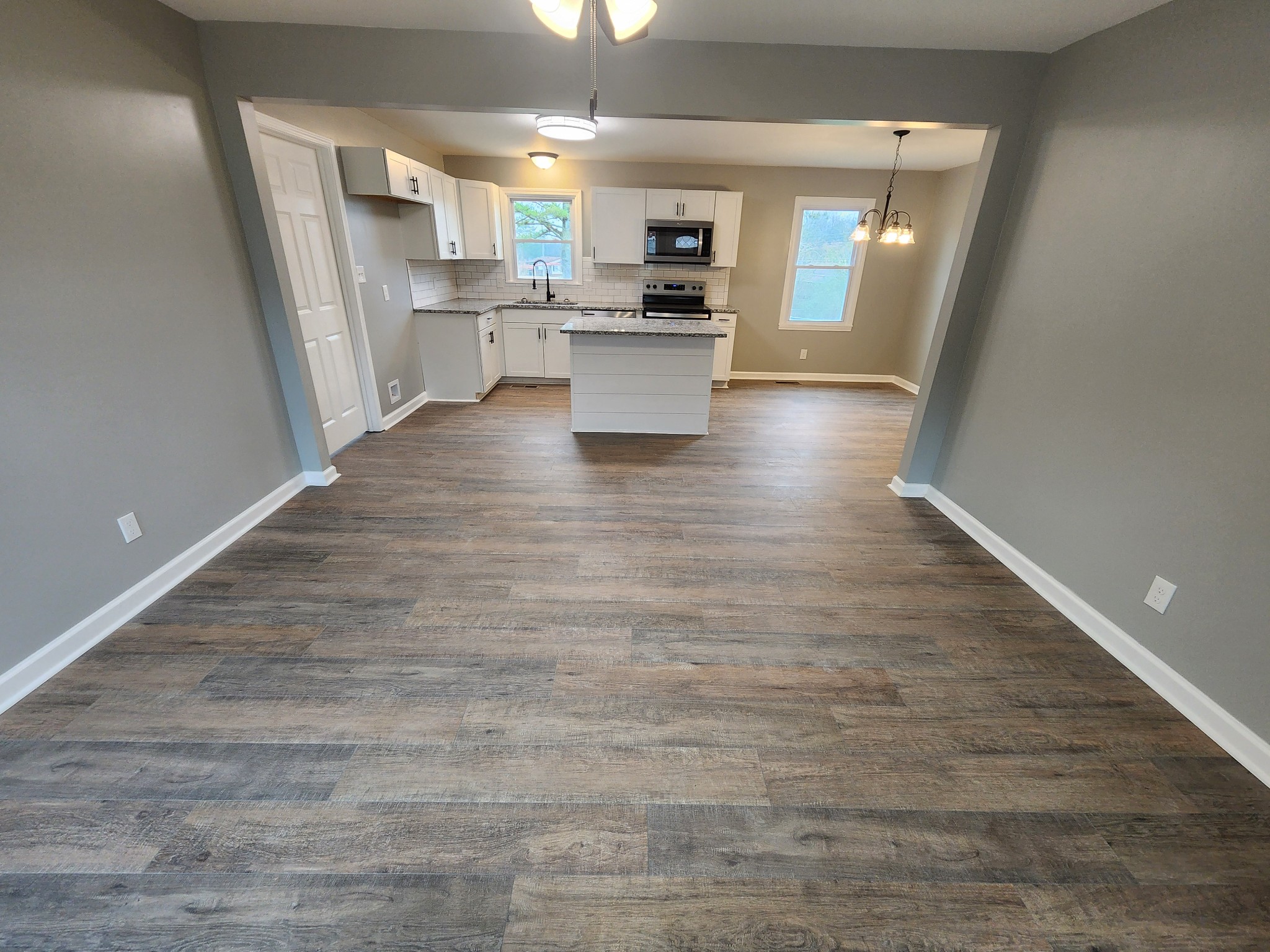 1301 Riley Hill Road Pulaski, TN 38478 - Photo 6 of 23 a view of kitchen with sink microwave and stove