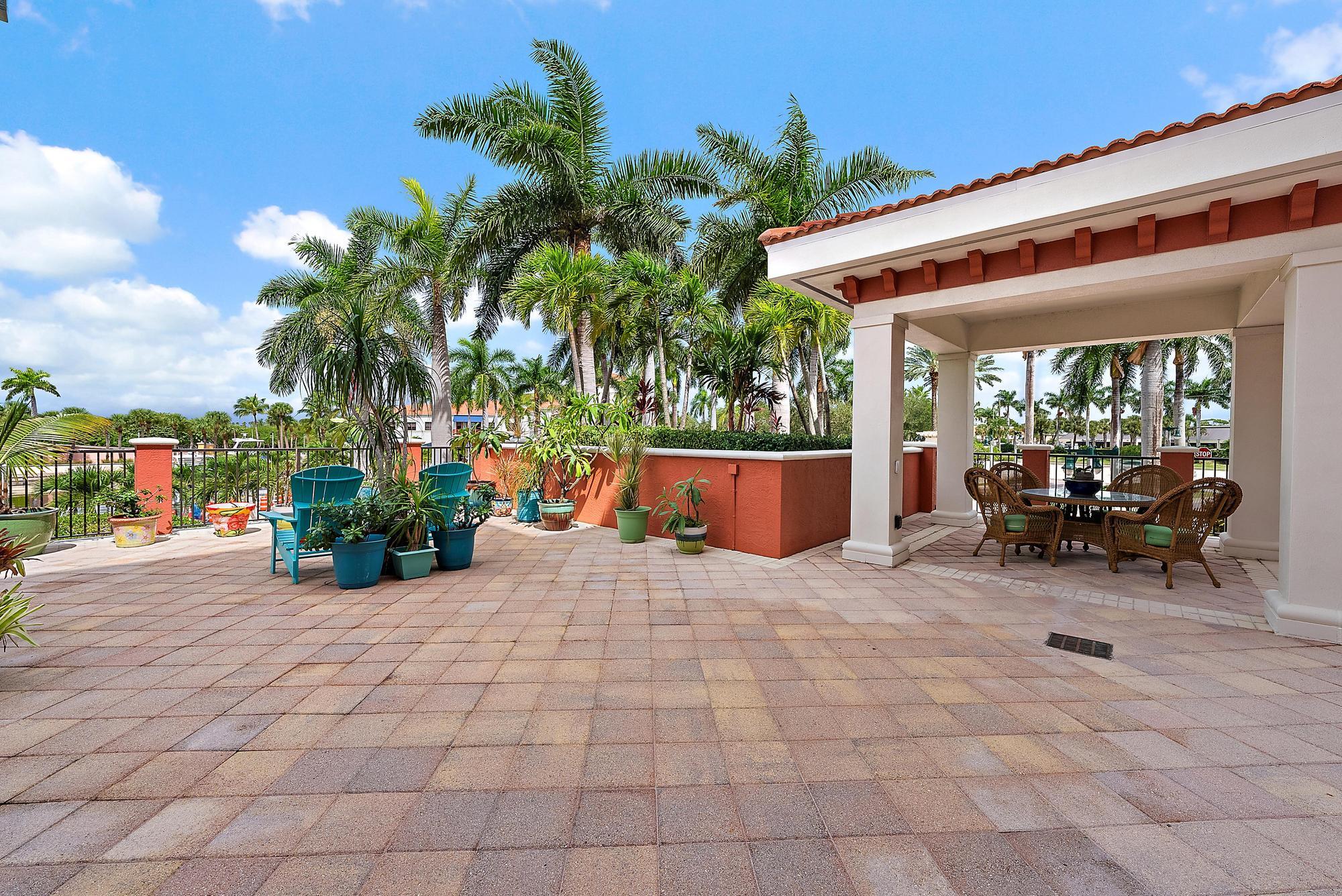 400 Highway 1, Unit 104 Jupiter, FL 33477 - Photo 18 of 35 a view of outdoor space yard and porch