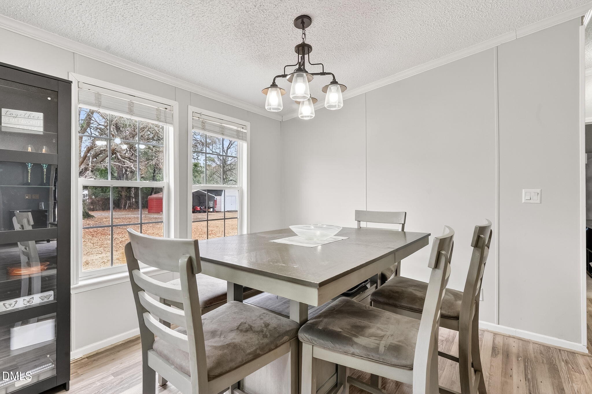 112 Morgan Street Erwin, NC 28339 - Photo 13 of 35 a view of a dining room with furniture window and wooden floor