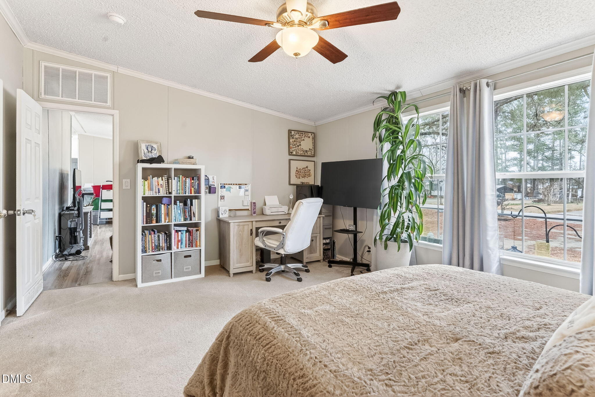 112 Morgan Street Erwin, NC 28339 - Photo 15 of 35 a view of a bedroom with workspace and a window