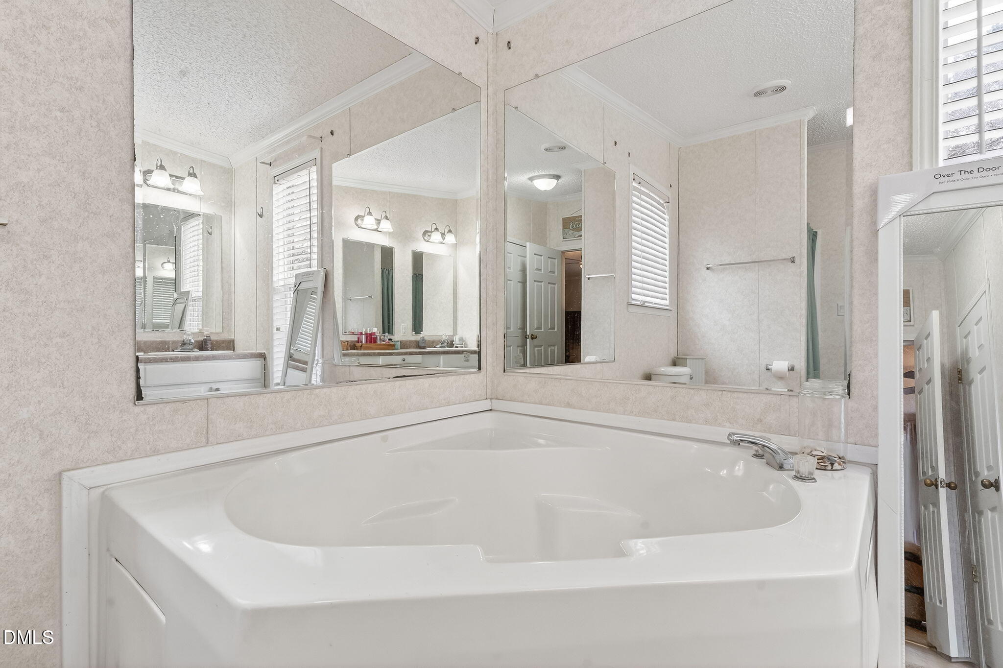 112 Morgan Street Erwin, NC 28339 - Photo 18 of 35 a bathroom with a bathtub and a shower