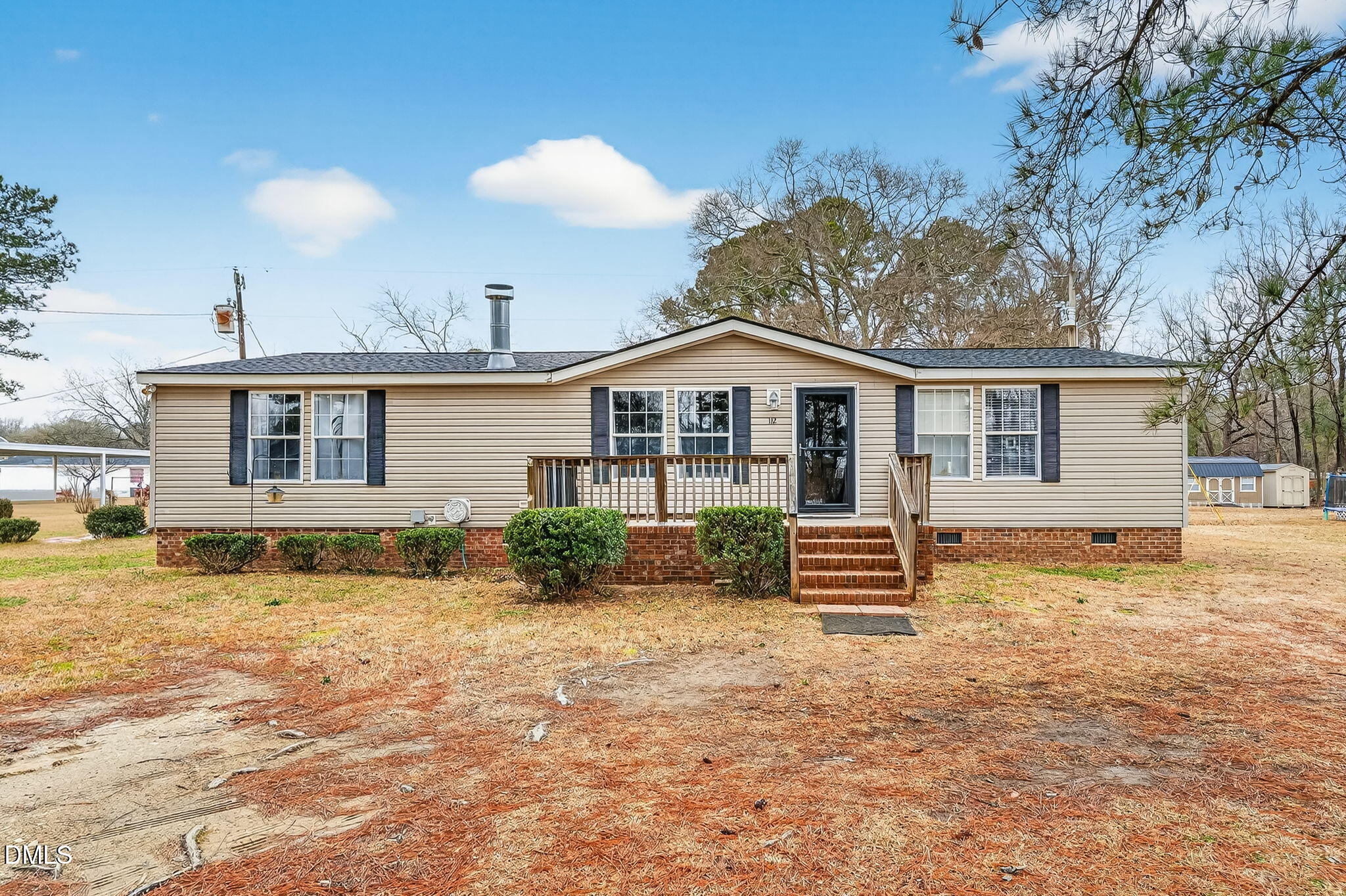 112 Morgan Street Erwin, NC 28339 - Photo 2 of 35 a front view of a house with a yard