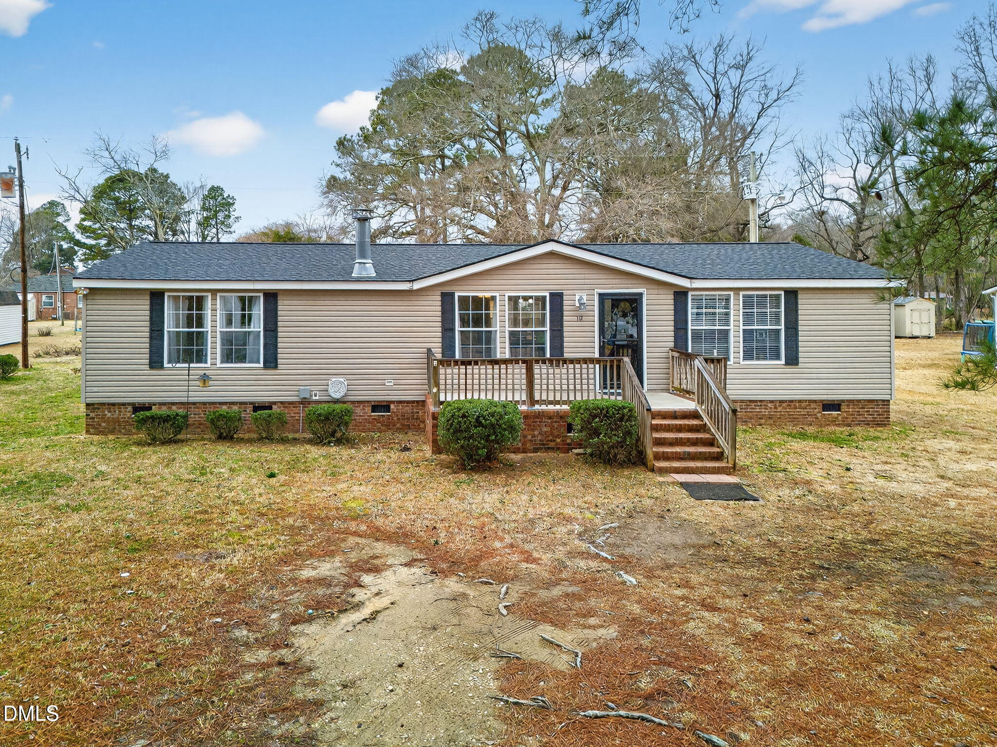112 Morgan Street Erwin, NC 28339 - Photo 33 of 35 front view of a house with a yard