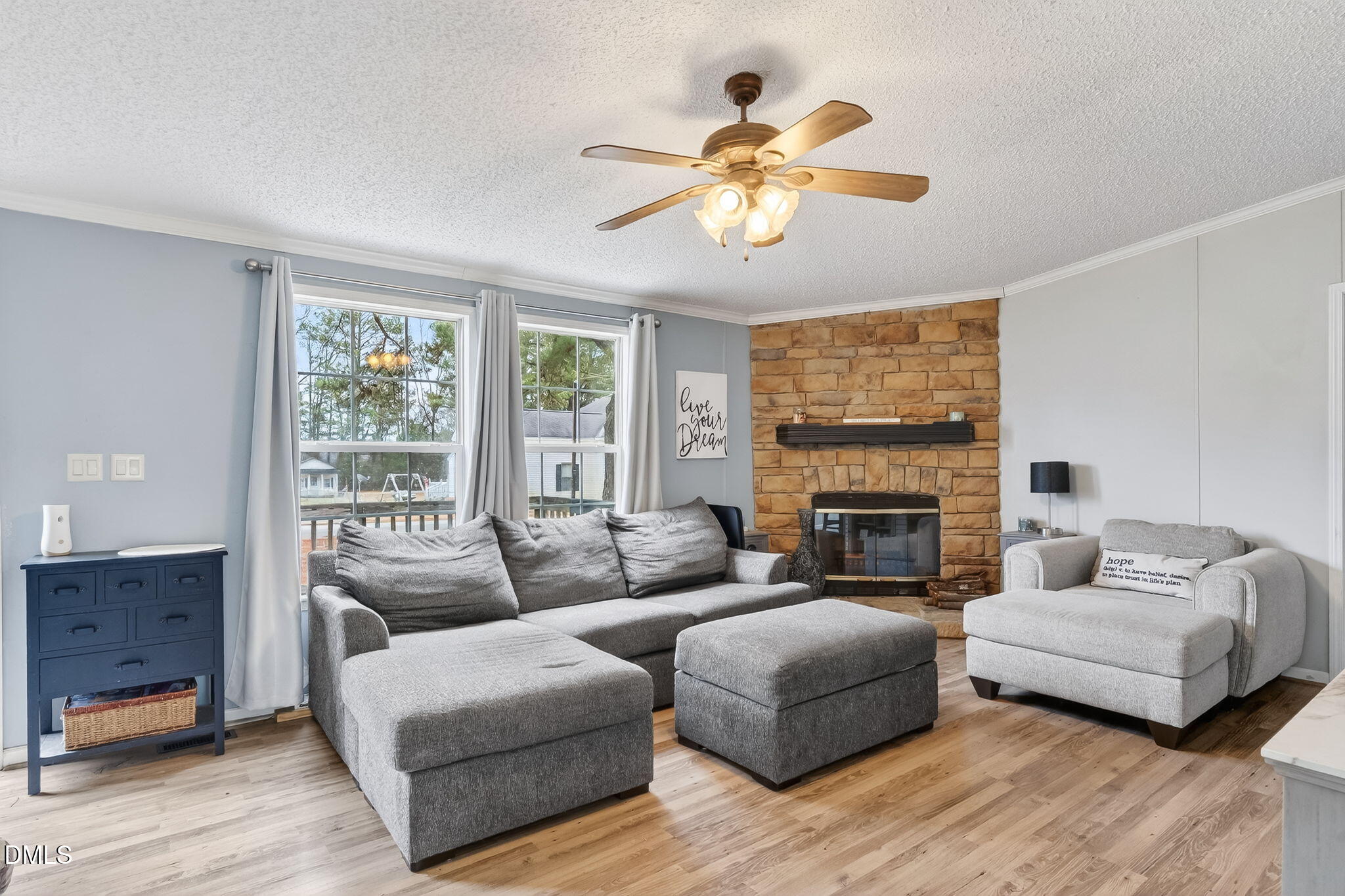 112 Morgan Street Erwin, NC 28339 - Photo 8 of 35 a living room with furniture and a fireplace