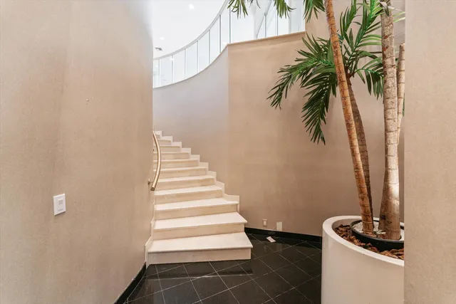 a view of a lake with a building in the background