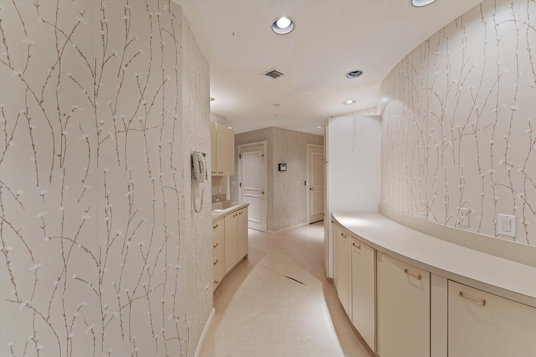 49 West High Point Road Sewall's Point, FL 34996 - Photo 39 of 99 a bathroom with a sink and a shower