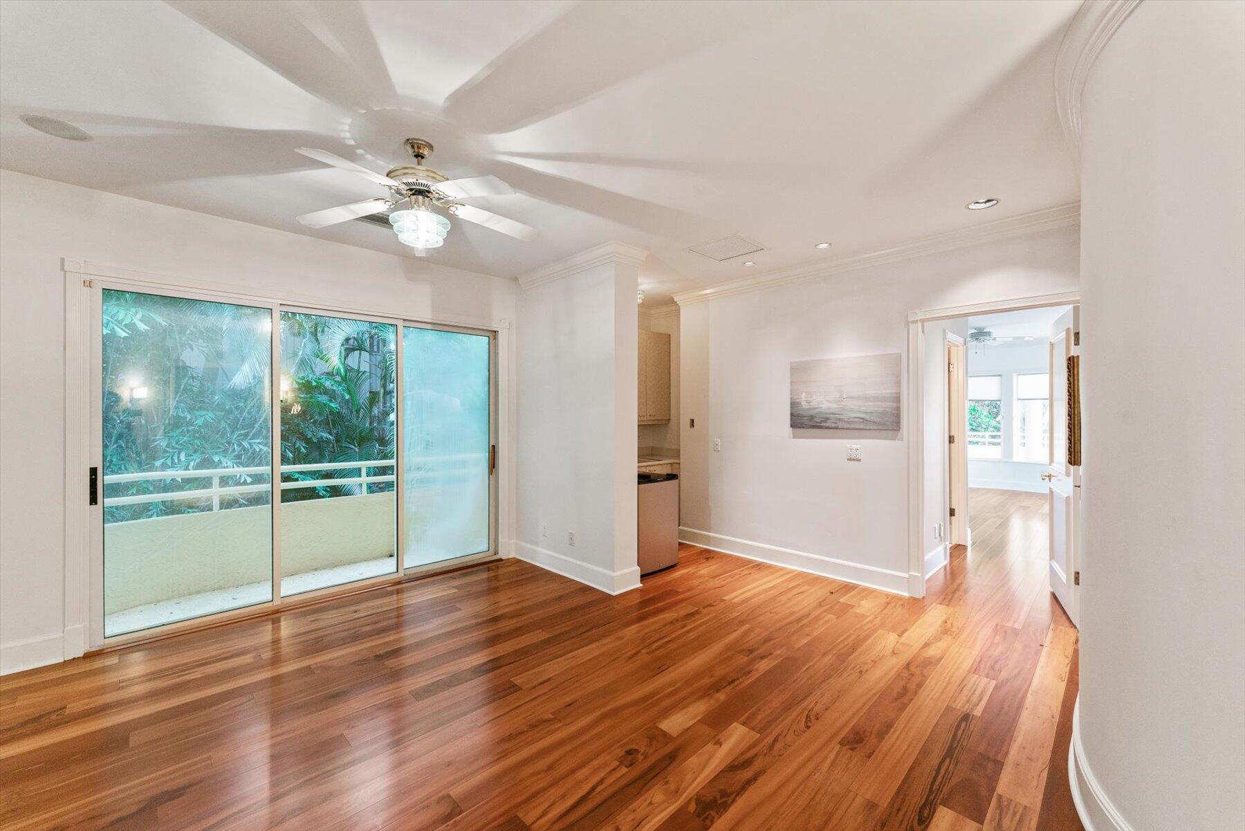 49 West High Point Road Sewall's Point, FL 34996 - Photo 46 of 99 a view of an empty room with wooden floor and a window