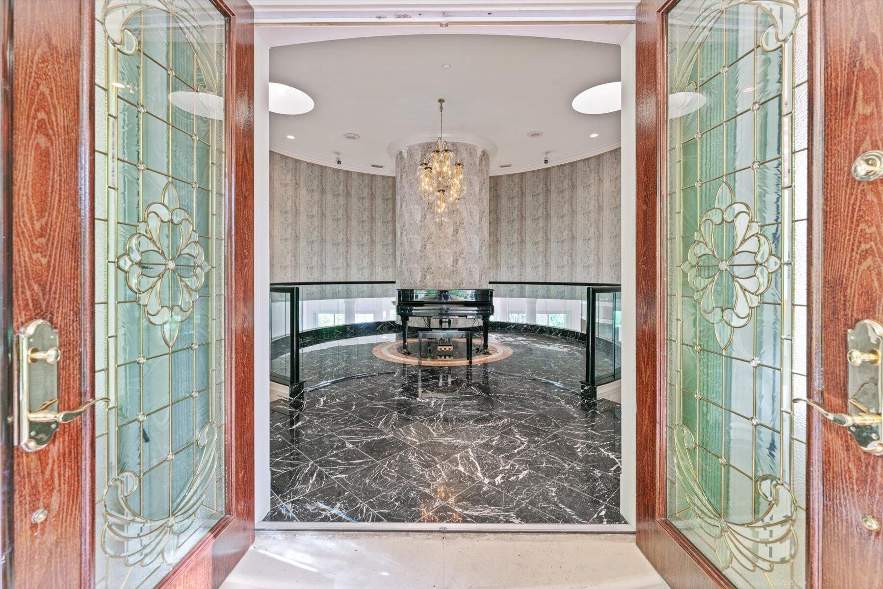 49 West High Point Road Sewall's Point, FL 34996 - Photo 10 of 99 a view of a living room filled with furniture